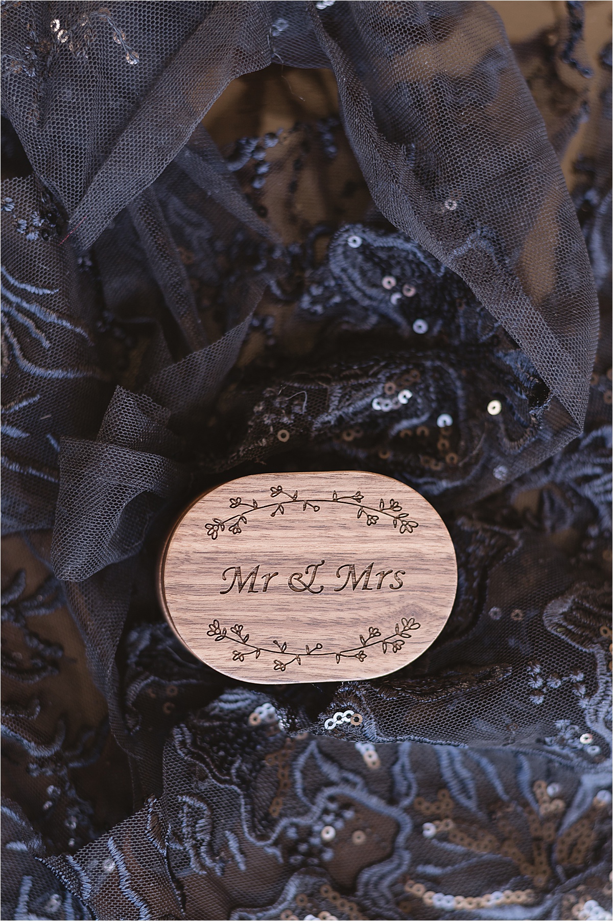 wedding ring box from halloween wedding on black sparkly material