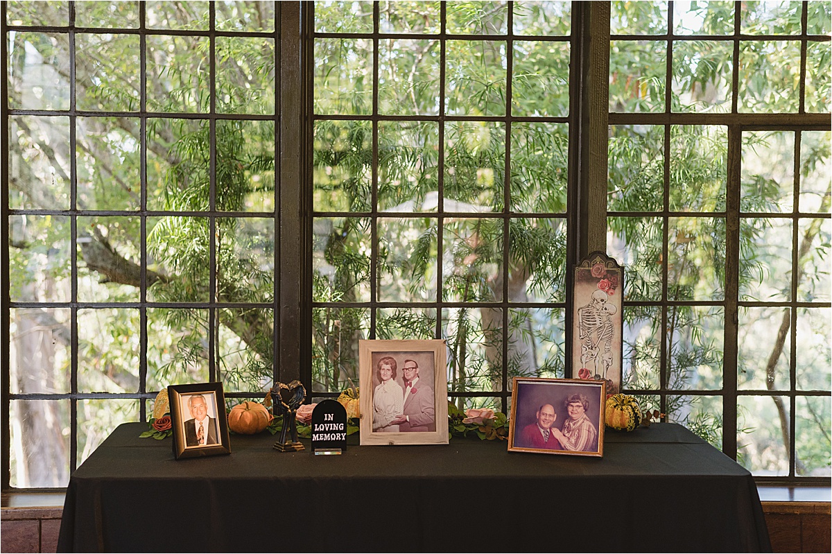 altar table with photos of loved ones who have died