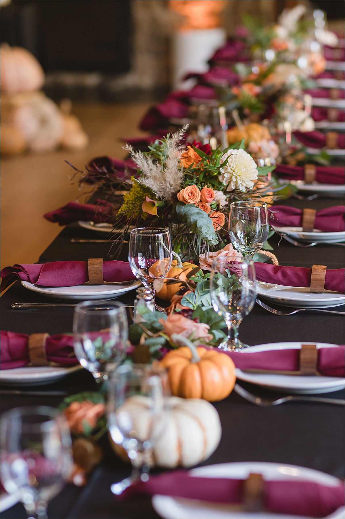 long tablescape with pumpkins for a halloween wedding
