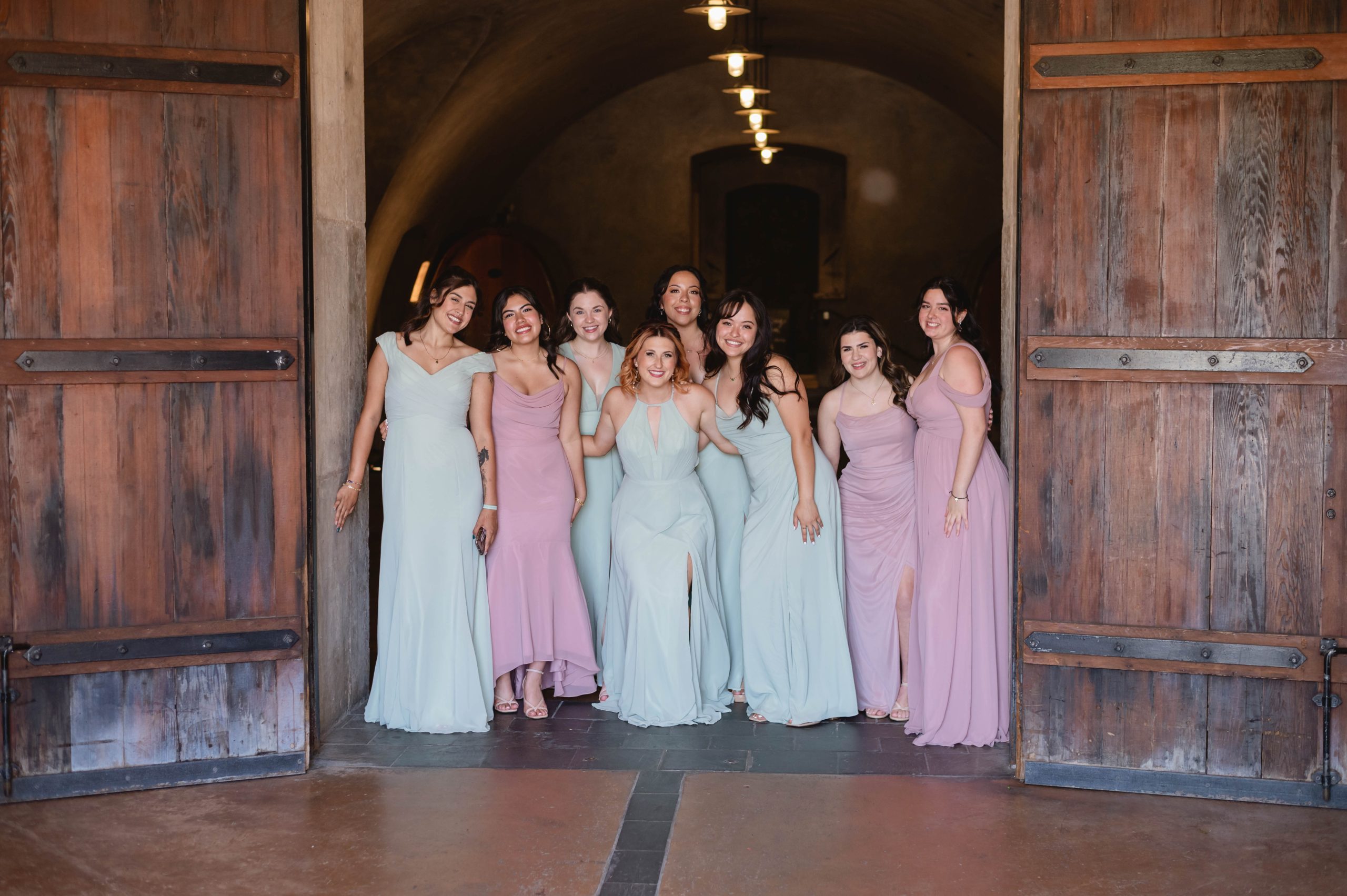 Bridesmaids and Maid of honor MOH waiting to see the bride reveal her wedding dress to them at Viansa Winery in Sonoma