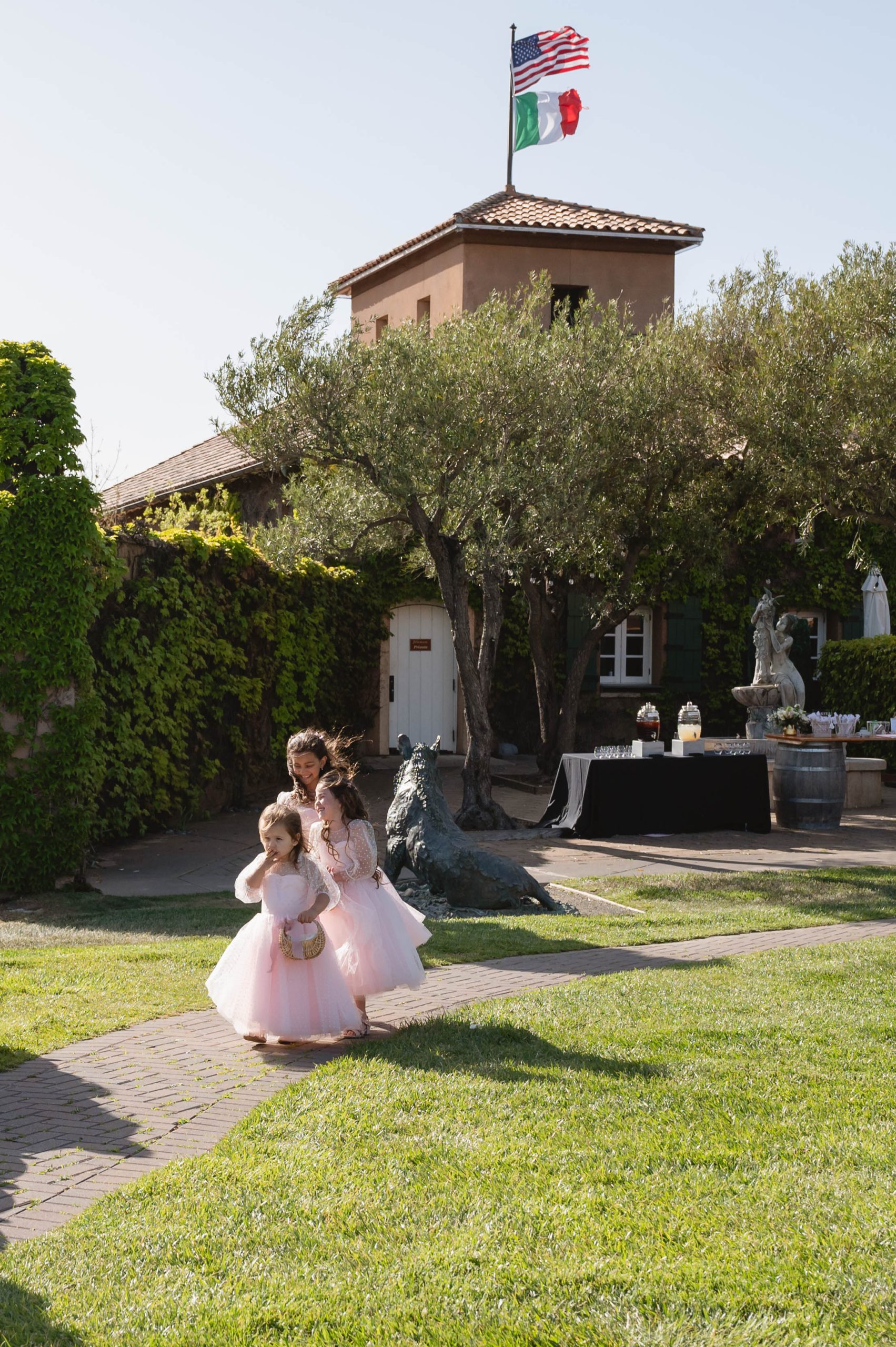 Flower girls playing before the ceremony starts Soft Romantic + Minimalistic Wedding at Viansa Winery in Sonoma Jen Vazquez Photography