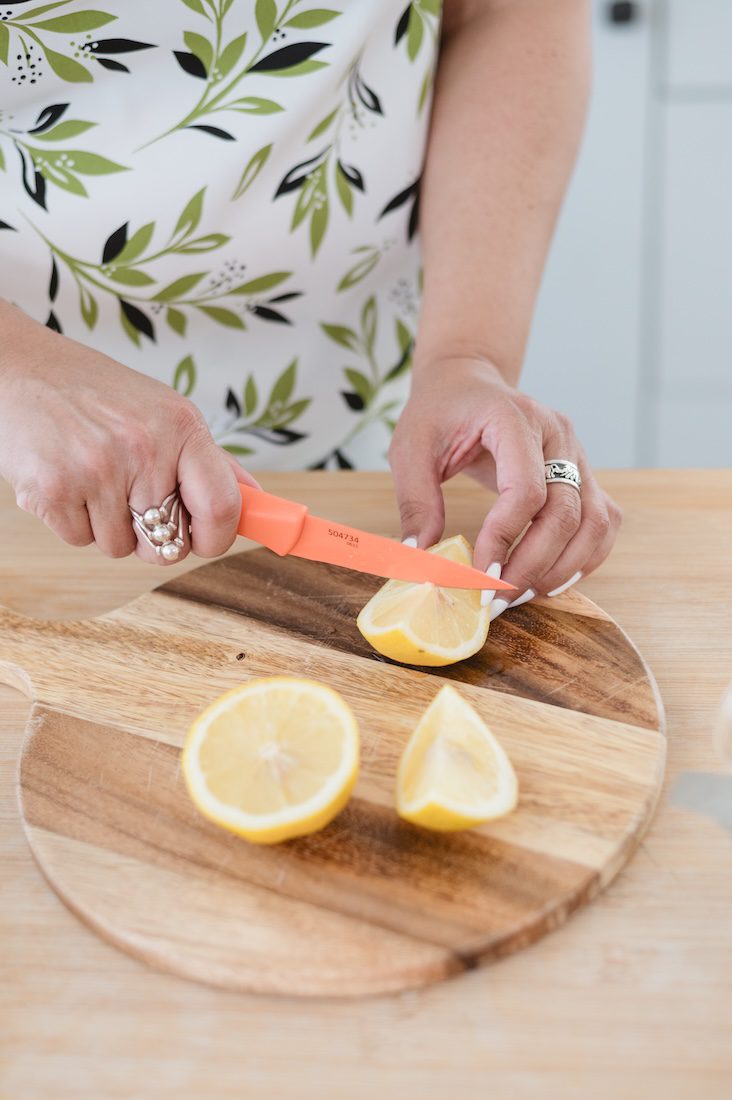 Annabell Lindo of ShiftWell slicing lemons detail shot at The Sunlight Space in Los Altos California by Jen Vazquez Media