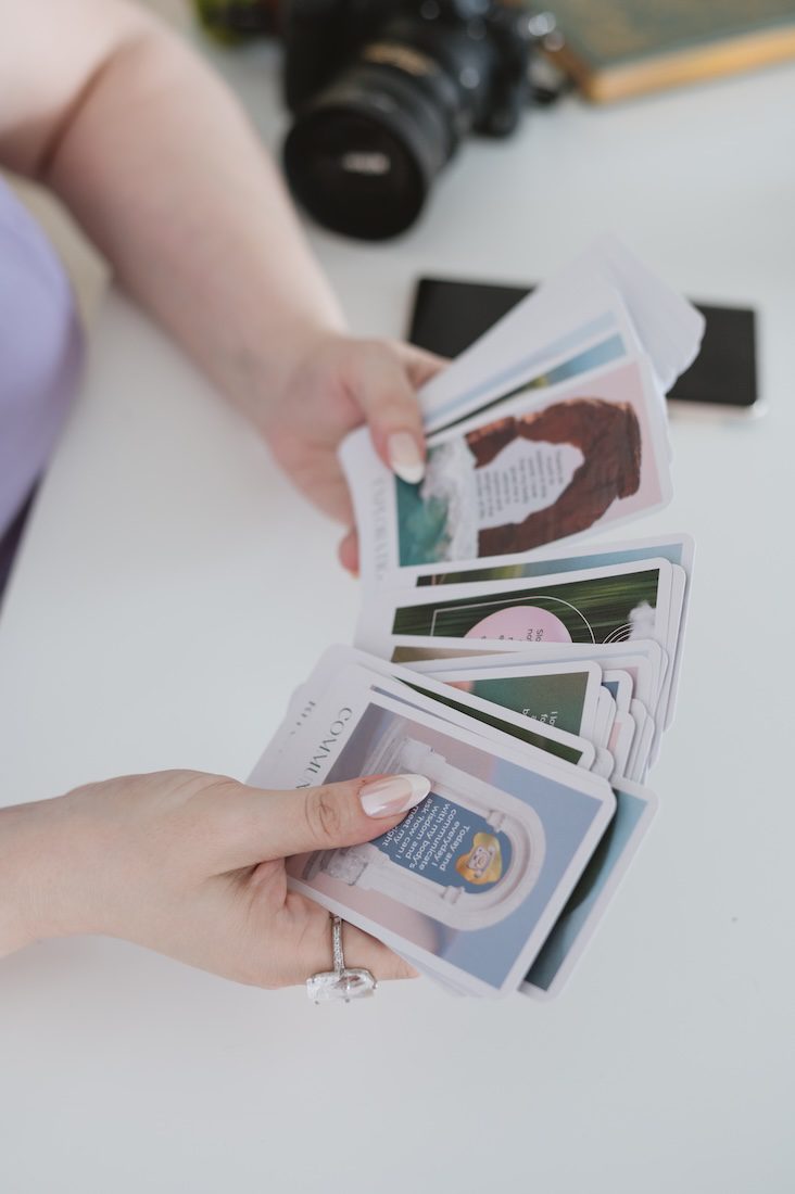 I captured my client who's a photographer (maiden mother crone). she wanted to feature her oracle cards as well as her camera.