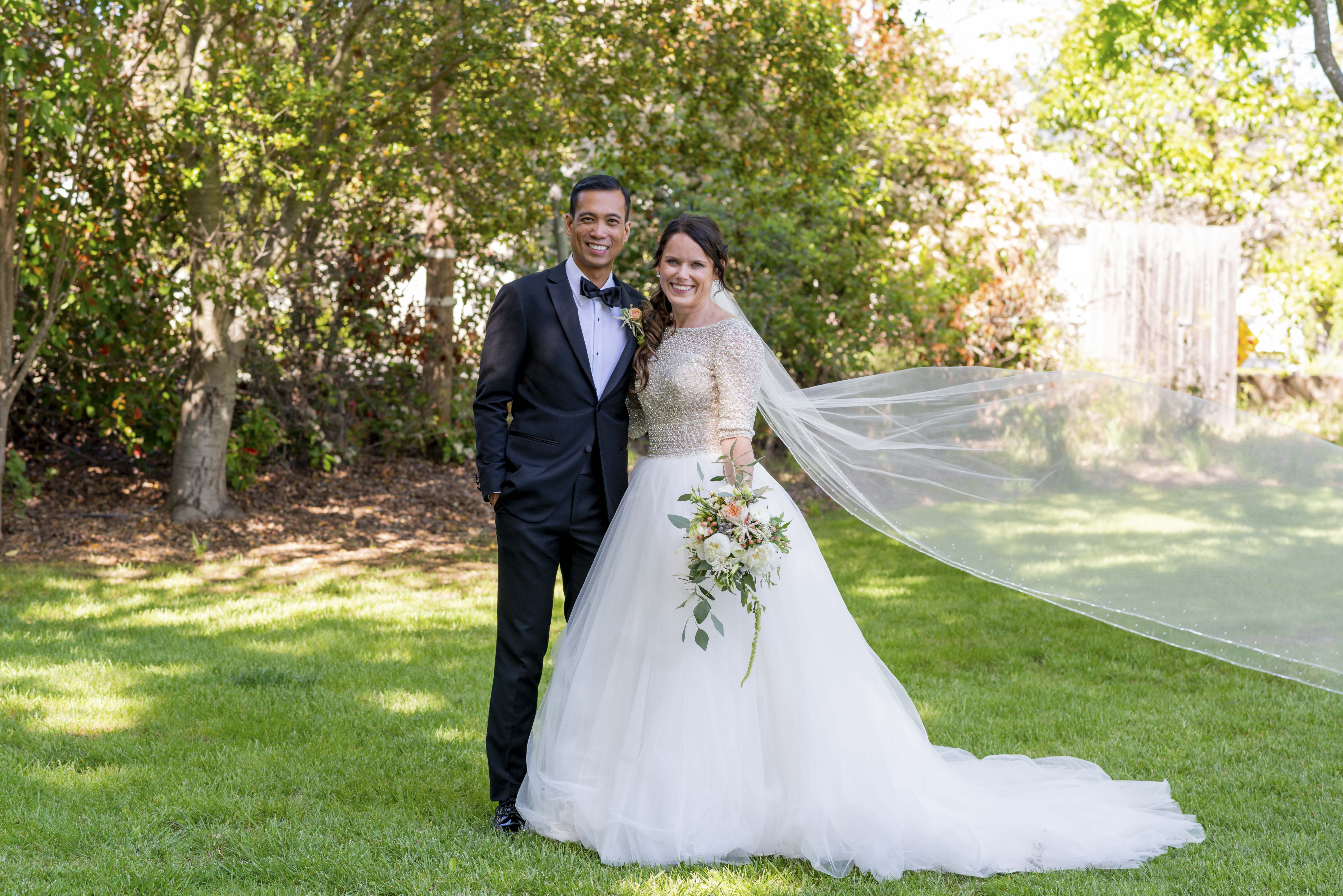 Bride and Groom with flowing veil Sonoma Wedding Hotel Depot Restaurant20180421VenessaMarlonWedding-1246